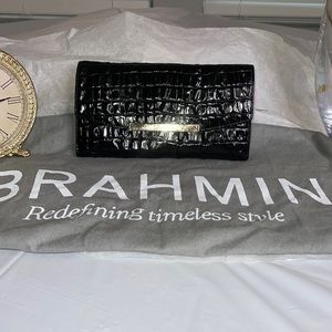 Brahmin trifold wallet in black with gold hardware